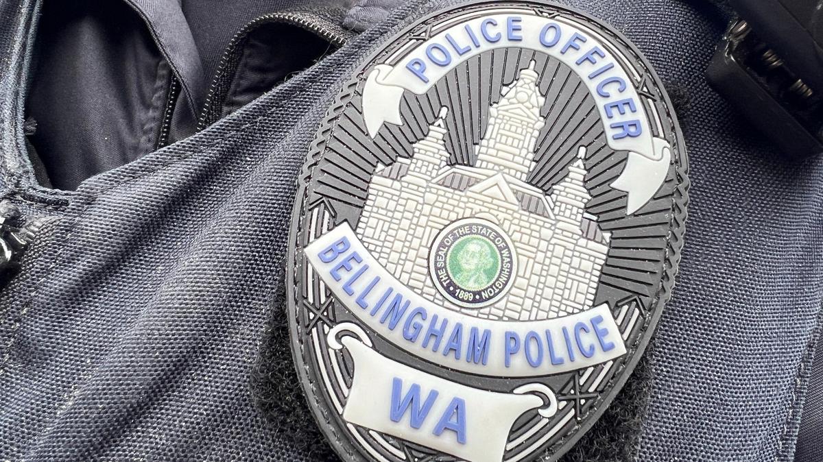 A new Bellingham Police Department badge is shown on Nov. 10, 2023. The new badges show the historic Old City Hall building and for the first come in both shiny gold plate and a muted nonrefelctive style.