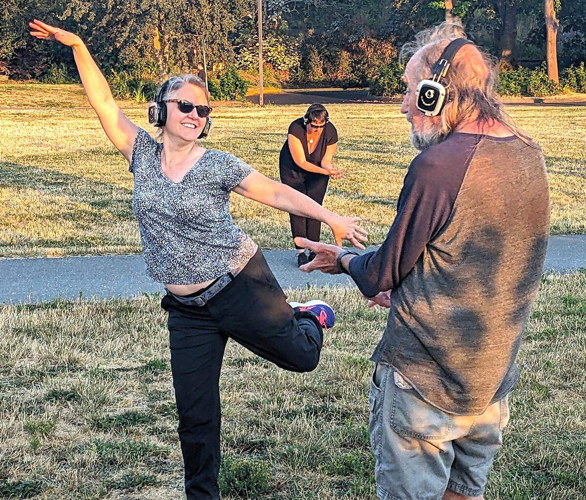 People dance during the Silent Disco at Boulevard Park in Bellingham, WA. on July 20, 2024.