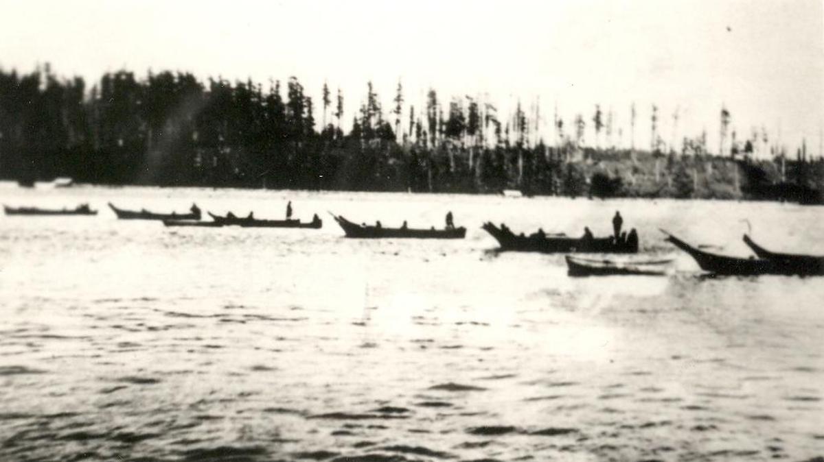 Lummi Nation fishers use reef net canoes near Lummi Island, circa 1960.