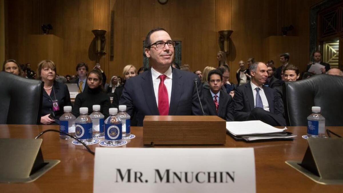Treasury Secretary-designate Steven Mnuchin arrives on Capitol Hill in Washington, Thursday, Jan. 19, 2017, to testify at his confirmation hearing before the Senate Finance Committee. Mnuchin built his reputation and his fortune as a savvy Wall Street investor but critics charge that he profited from thousands of home foreclosures as the chief of a sub-prime mortgage lender during the housing collapse.