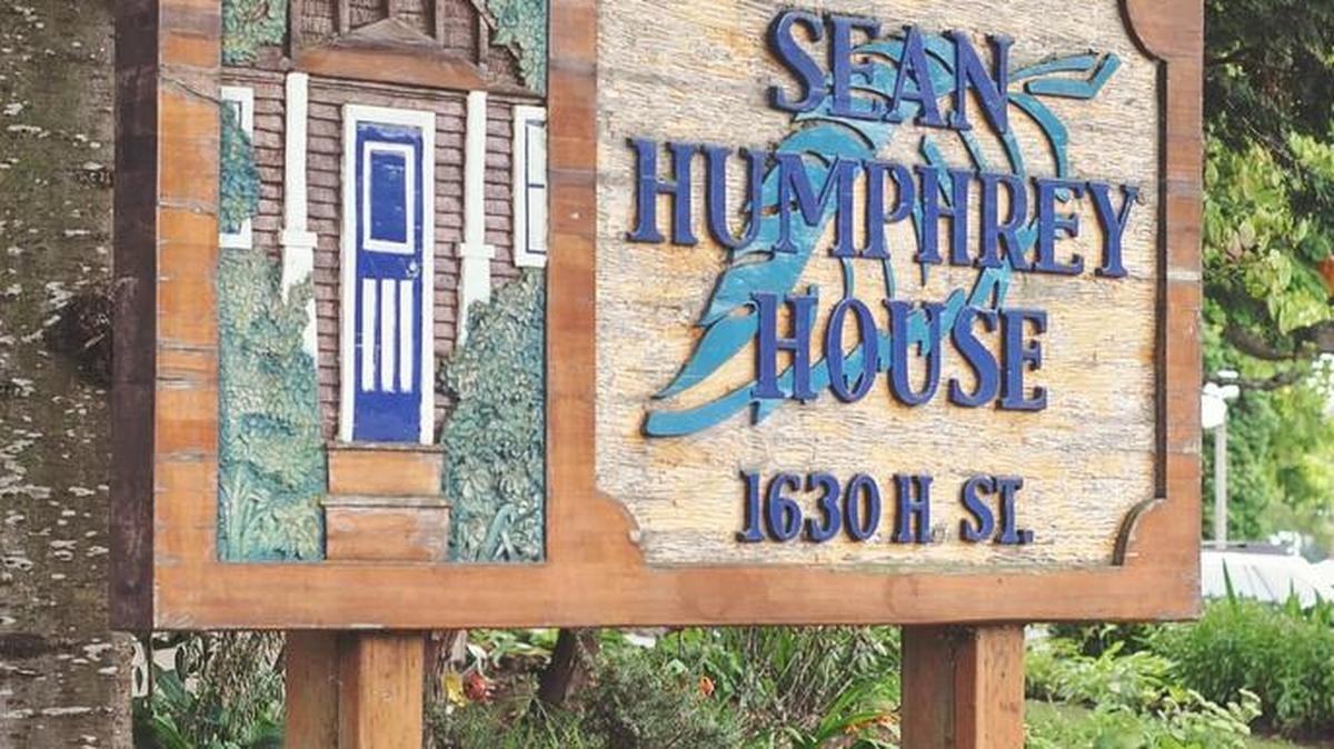 Sign marks the corner of the Sean Humphrey House lot.