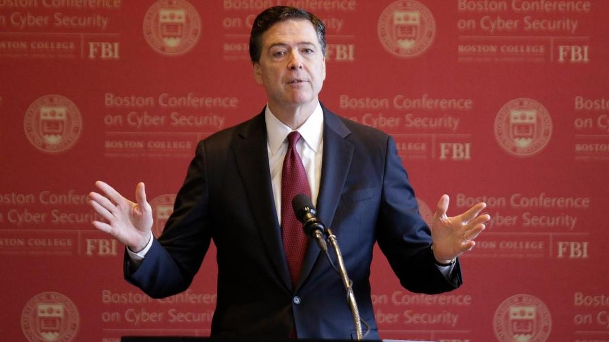 Former FBI Director James B. Comey gestures as he delivers an address on cyber security in Boston in March, 2017. The FBI continues to investigate the Trump campaign’s dealings with Russia.