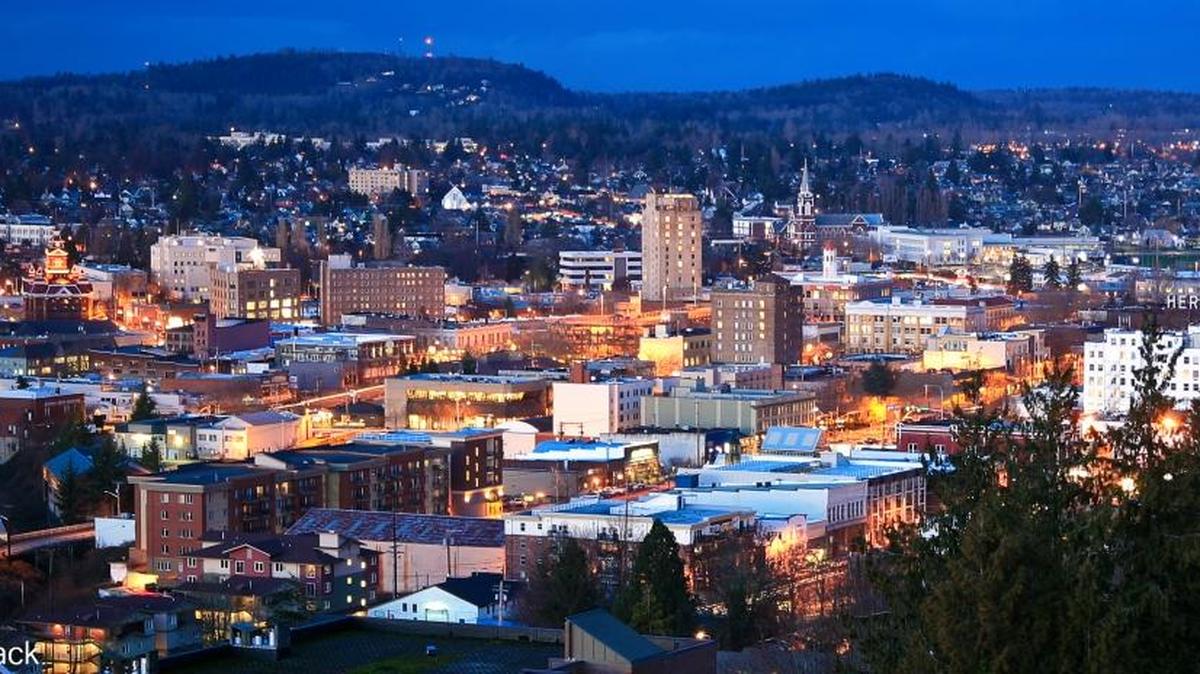 Bellingham lights up at dusk below the WWU campus.