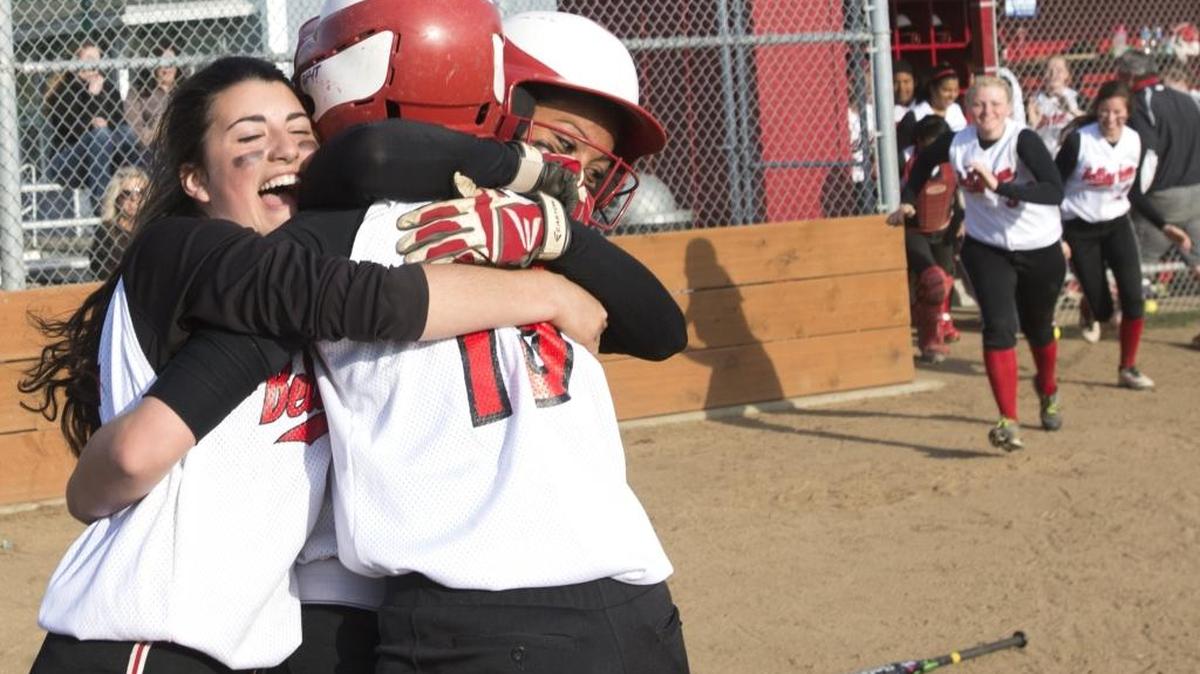 Bellingham softball players celebrate a win in May, 2015.
