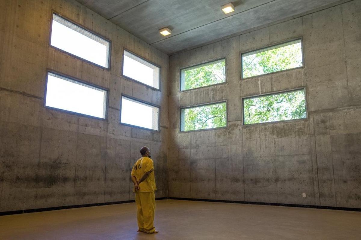 A high security inmate paces around the recreation area of Whatcom County Jail during his weekly hour for recreation in 2015 in Bellingham.