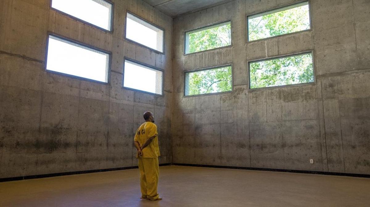 A high security inmate paces around the recreation area of Whatcom County Jail during his weekly hour for recreation in 2015 in Bellingham.
