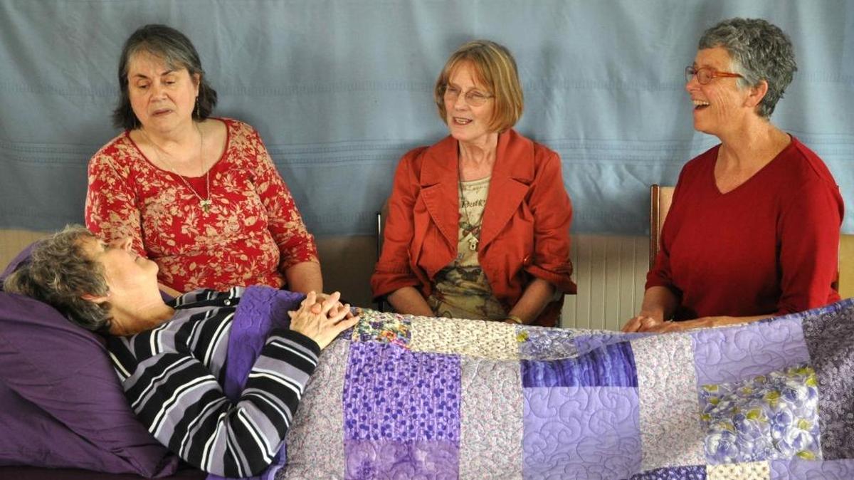 Bellingham Threshold Singers Mary Penttinen-King, Susie Bradley and Mel Freal sing for Ellen Grybeck in 2013.
