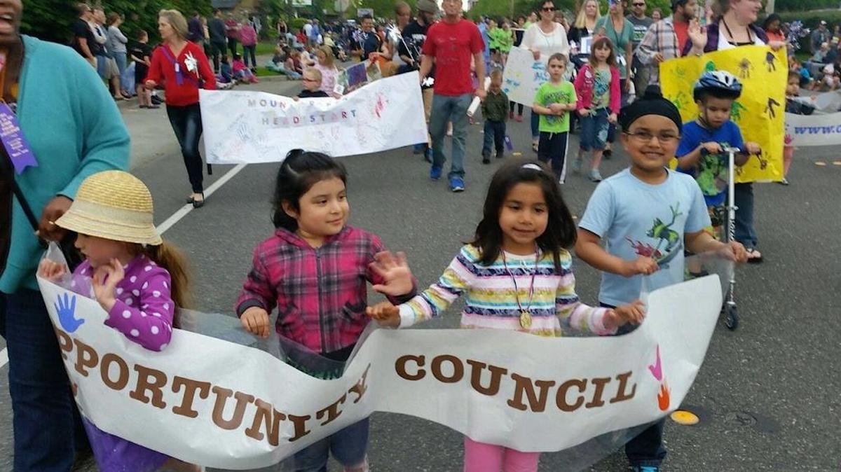 Early learning program staff and families march with the Opportunity Council in the Ski to Sea parade in Bellingham in 2014.