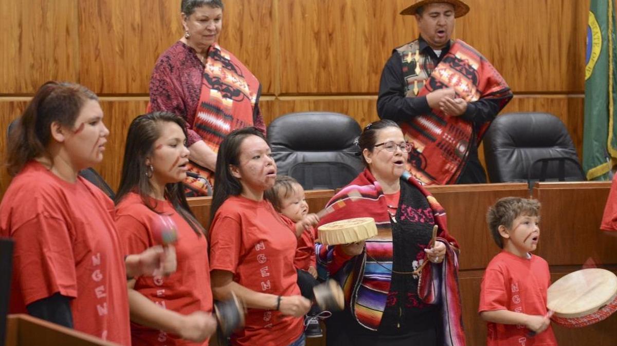Members of the Native American performance group, Ngen'tse Ste'ky'e (pack of wolves) perform at the first Coast Salish Day in Bellingham at the Bellingham City Council Chambers Monday, Oct. 12, 2015. The Bellingham City Council voted to rename Columbus Day to Coast Salish Day to honor local tribes.