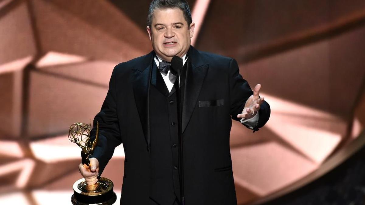 Patton Oswalt accepts the award for outstanding writing for a variety series for “Patton Oswalt: Talking for Clapping” at the 68th Primetime Emmy Awards on Sept. 18, 2016, in Los Angeles. Oswalt, a comedian and actor, has been pushing the idea of an April 15 march against Trump, to demand release of the president’s tax returns.