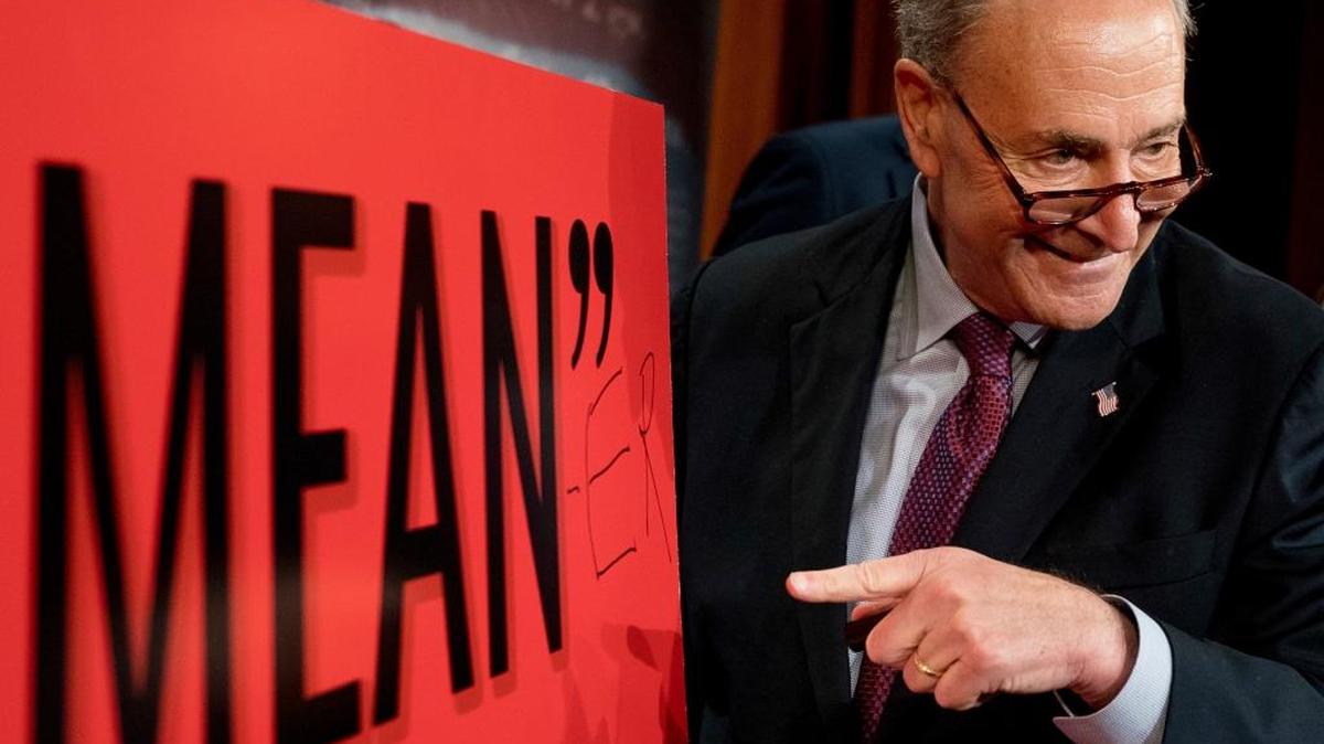 Senate Minority Leader Chuck Schumer, D-N.Y., writes “Mean-er” on a reported quote by President Donald Trump as Schumer responds to the release of the Republicans’ healthcare bill which represents the long-awaited attempt to scuttle much of President Barack Obama’s Affordable Care Act, at the Capitol in Washington, Thursday, June 22, 2017.