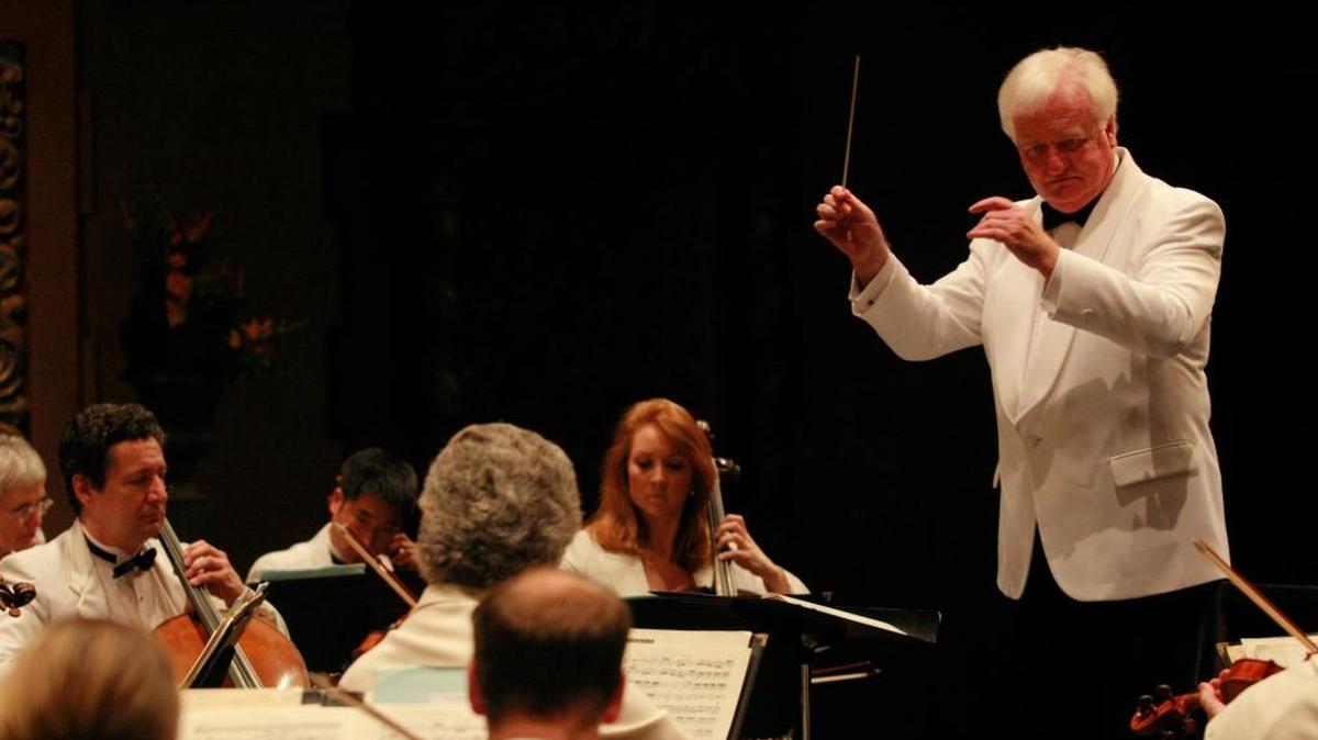 Artistic Director Michael Palmer conducts the Bellingham Festival Orchestra at the Western Washington University Performing Arts Center in 2014. The 23rd annual season opens July 1, 2016.