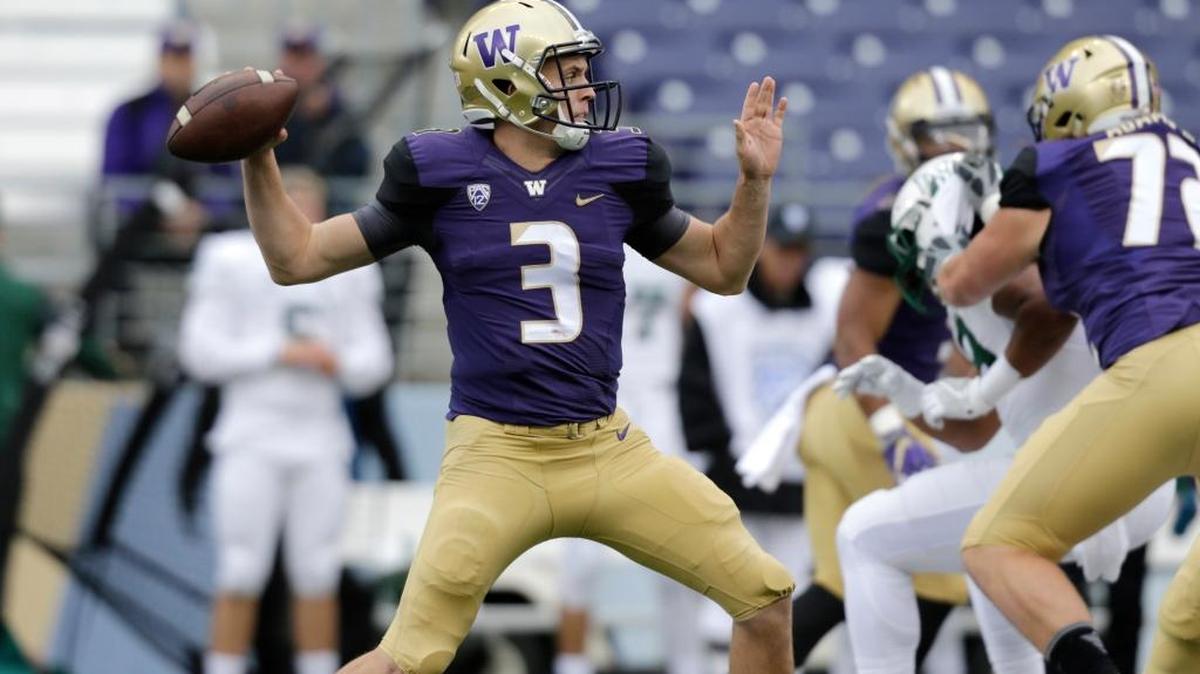 UW’s Jake Browning throws a pass against Portland State on Saturday at Husky Stadium. Browning finished 12 for 19 passing for 163 yards and four touchdowns.