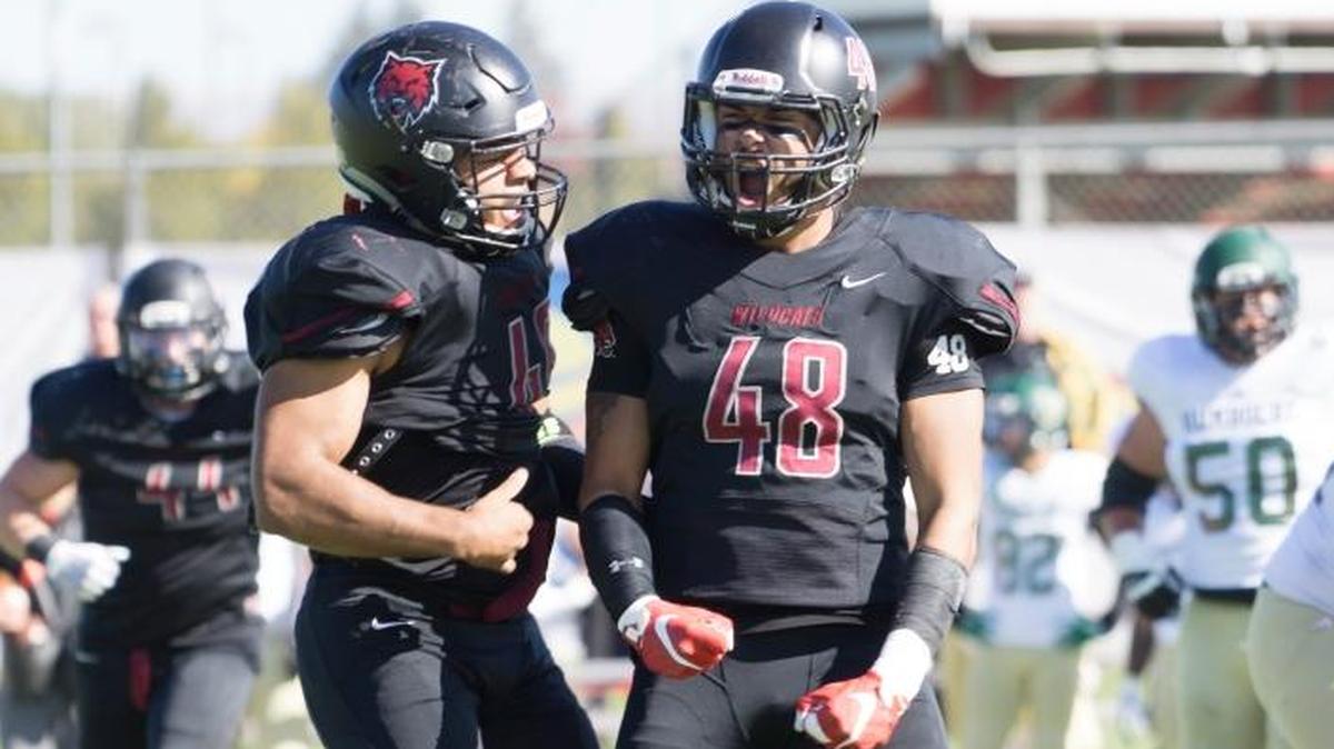 Former Sehome and Central Washington football standout Bo Banner, right, earned honorable mention NCAA Division II All-American honors Friday.