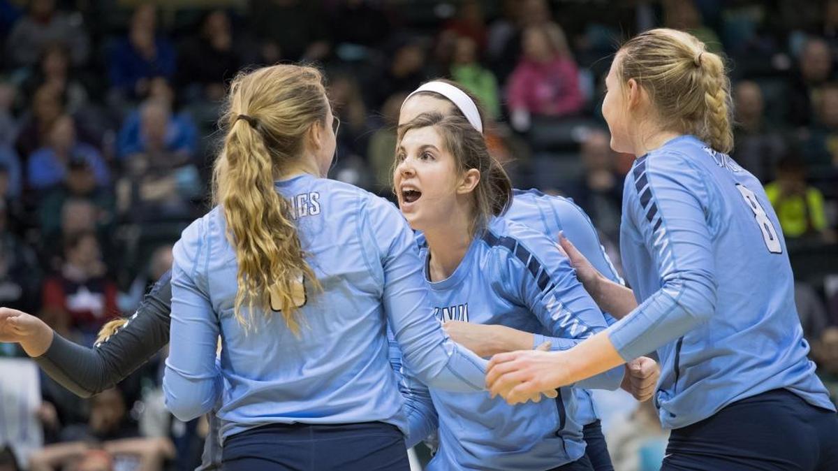 Outside hitter Abby Phelps (center) celebrates with teammates after the Vikings score a point against Cal State San Bernadino in the semifinal match of the NCAA Division II West Regional Friday. With the win, Western advances to the Elite 8 held Dec. 8-10 in Sioux Falls, SD.