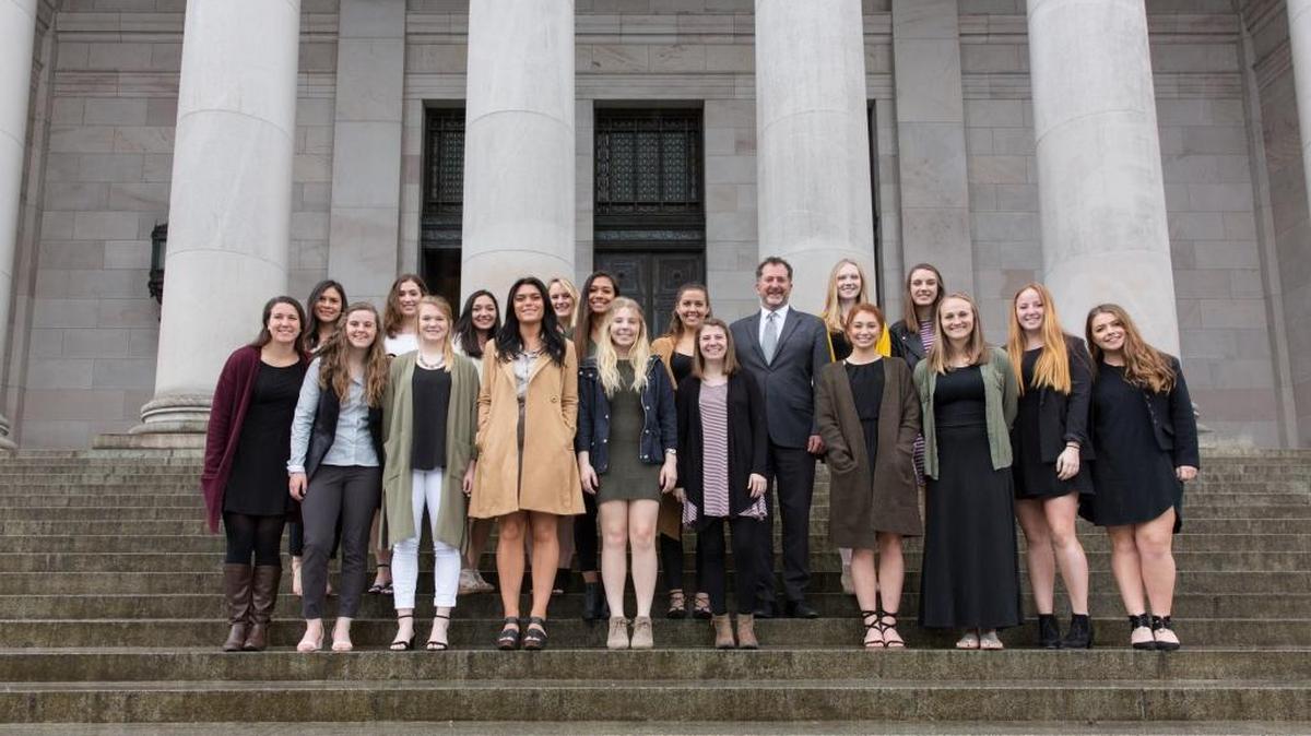 Sen. Ranker stands with the Western Washington University women’s soccer team Thursday outside the state capitol in Olympia. The Vikings were honored by the state senate for winning the NCAA Division II national title.