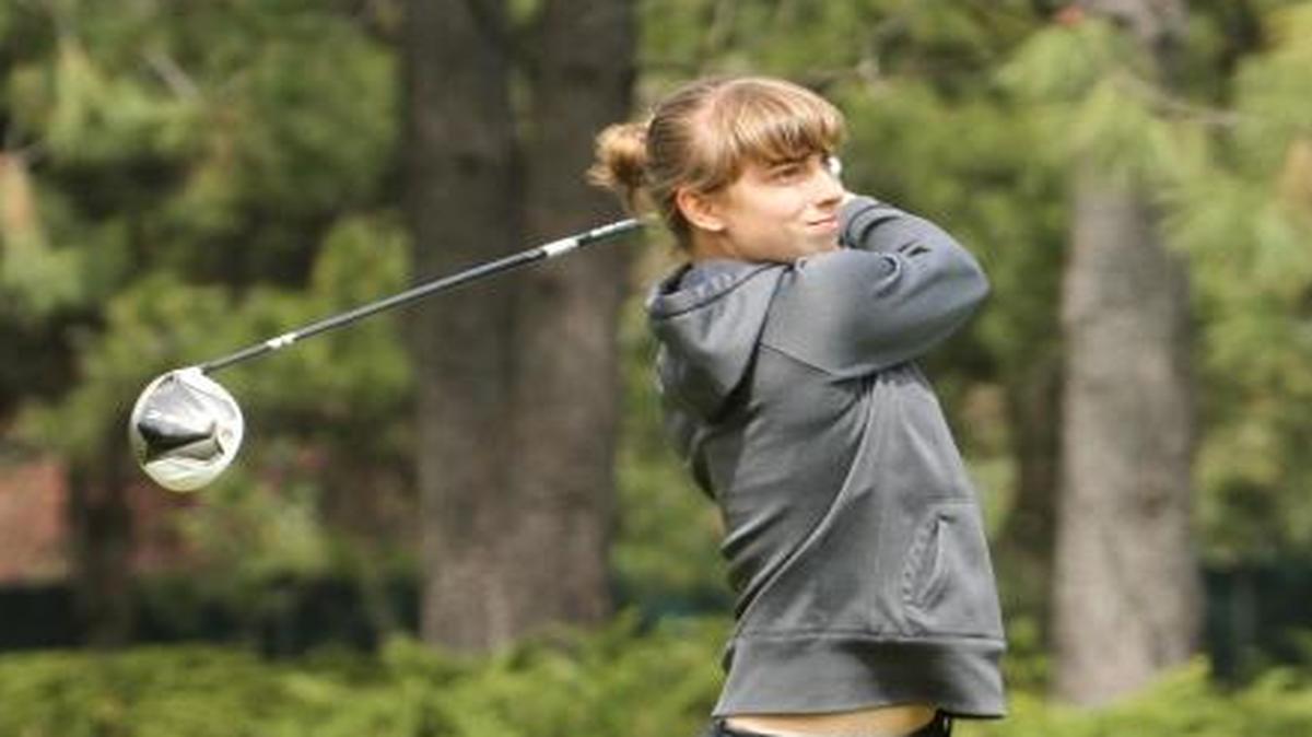Former Bellingham High golfer Jenn Paul watches a shot during Monday’s first round at the GNAC Women’s Golf Championships in Coeur d’Alene, Idaho. Paul tied for third.