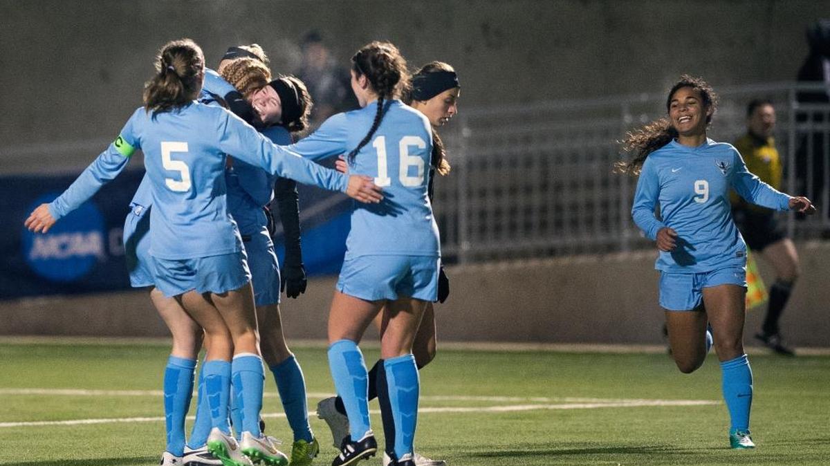 Western Washington University players swarm Caitlyn Jobanek after she scored the lone goal in a 1-0 victory over Azusa Pacific University to win the NCAA Division II West Regional final on Thursday, Nov. 19, at Robert S. Harrington Field in Bellingham,.