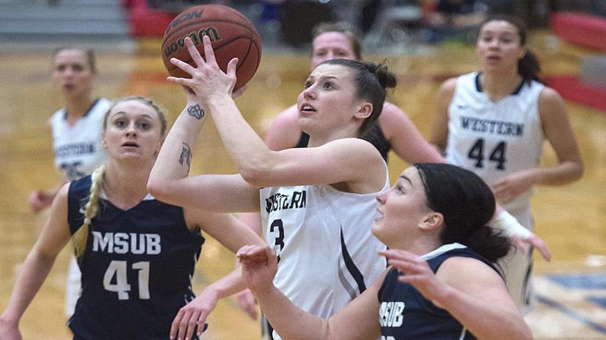 Western Washington’s Taylor Peacocke drive the lane against Montana State-Billings during the GNAC Women’s Basketball Championship semifinal at Saint Martin’s University in Lacey on March 4, 2016.