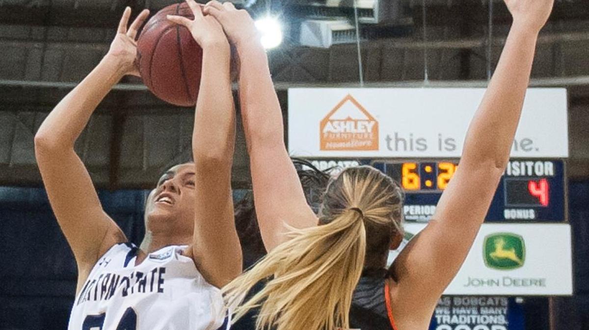 Montana State forward Jasmine Hommes (34) shoots against Idaho State’s Anna Policicchio Feb. 27 in Bozeman, Mont.