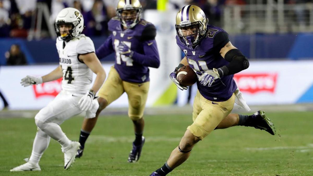 Washington defensive back Taylor Rapp (21) intercepts a Colorado pass during the second half of the Pacific-12 Conference championship game.