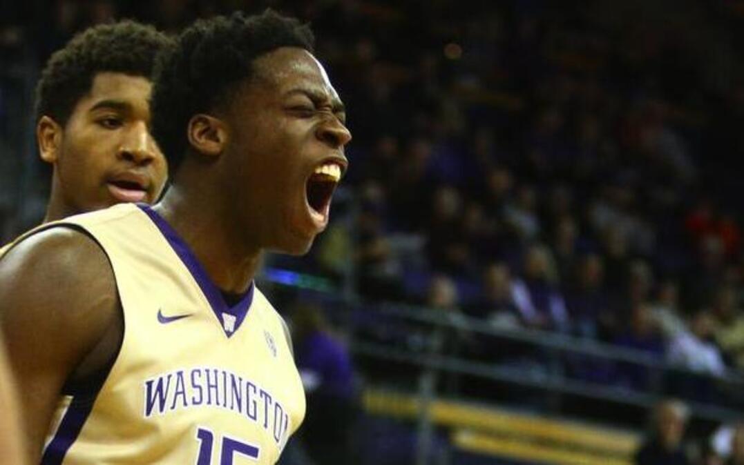 Washington's Noah Dickerson reacts after scoring while being fouled against the University of Pennsylvania on Saturday, Nov. 21, 2015, at Hec Edmundson Pavilion in Seattle.
