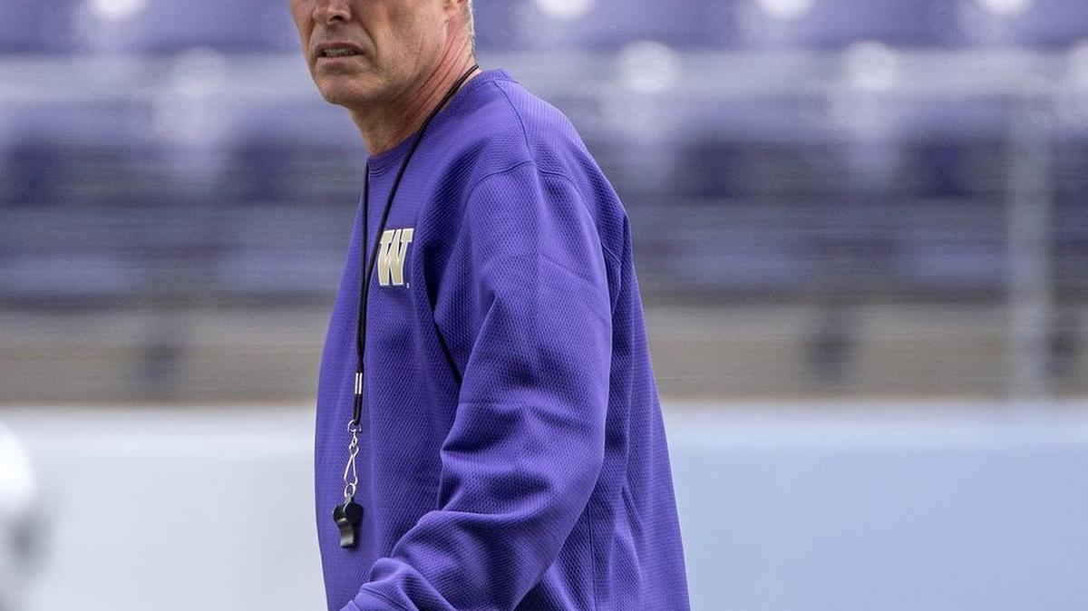 
 Head coach Chris Petersen and his Huskies began fall camp Saturday with two practices at Husky Stadium.
