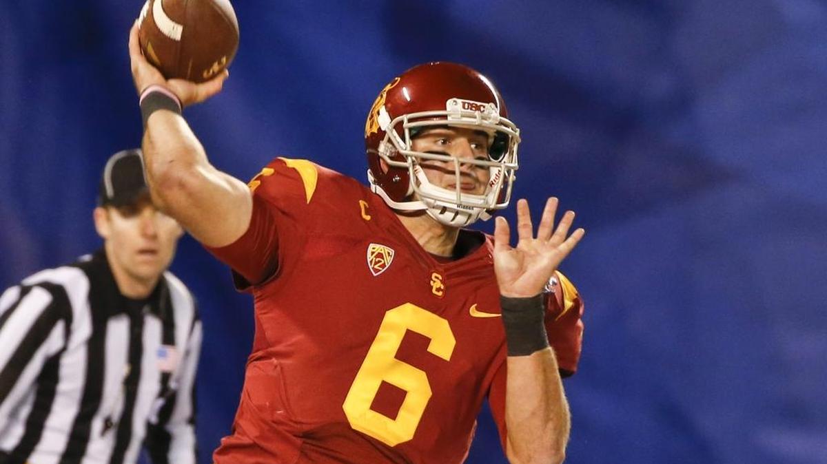 
FILE - In this Dec. 27, 2014, file photo, Southern California quarterback Cody Kessler throws a pass against Nebraska during the first half of the Holiday Bowl NCAA college football game in San Diego. Kessler thinks his third season as USC's starting quarterback will be the season when the Trojans finally have the depth and poise to live up to their lofty expectations. (AP Photo/Lenny Ignelzi, File)
