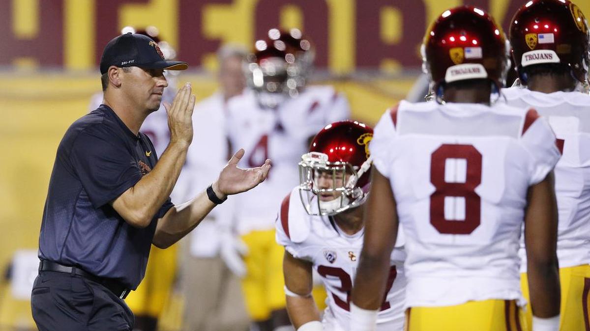 
Current USC coach Steve Sarkisian, left, is facing his former team — Washington — for the first time since he left UW in 2013 when the Huskies meet the 17th-ranked Trojans on Thursday in Los Angeles.
