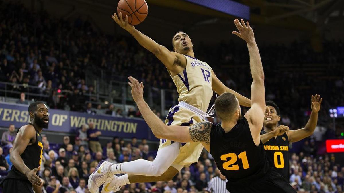 Washington’s Andrew Andrews sails into the lane against Arizona State during the first half on Feb. 3