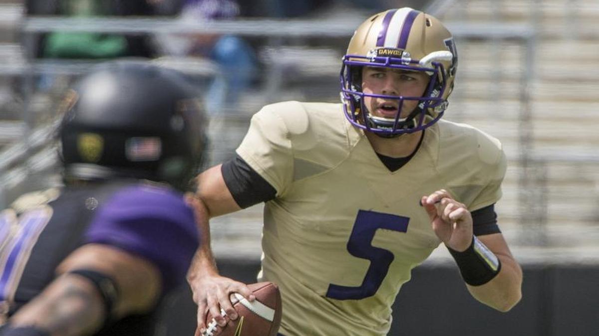 
Washington quarterback Jeff Lindquist, a Mercer Island High grad, says he doesn’t mind occasional contact during practice.
