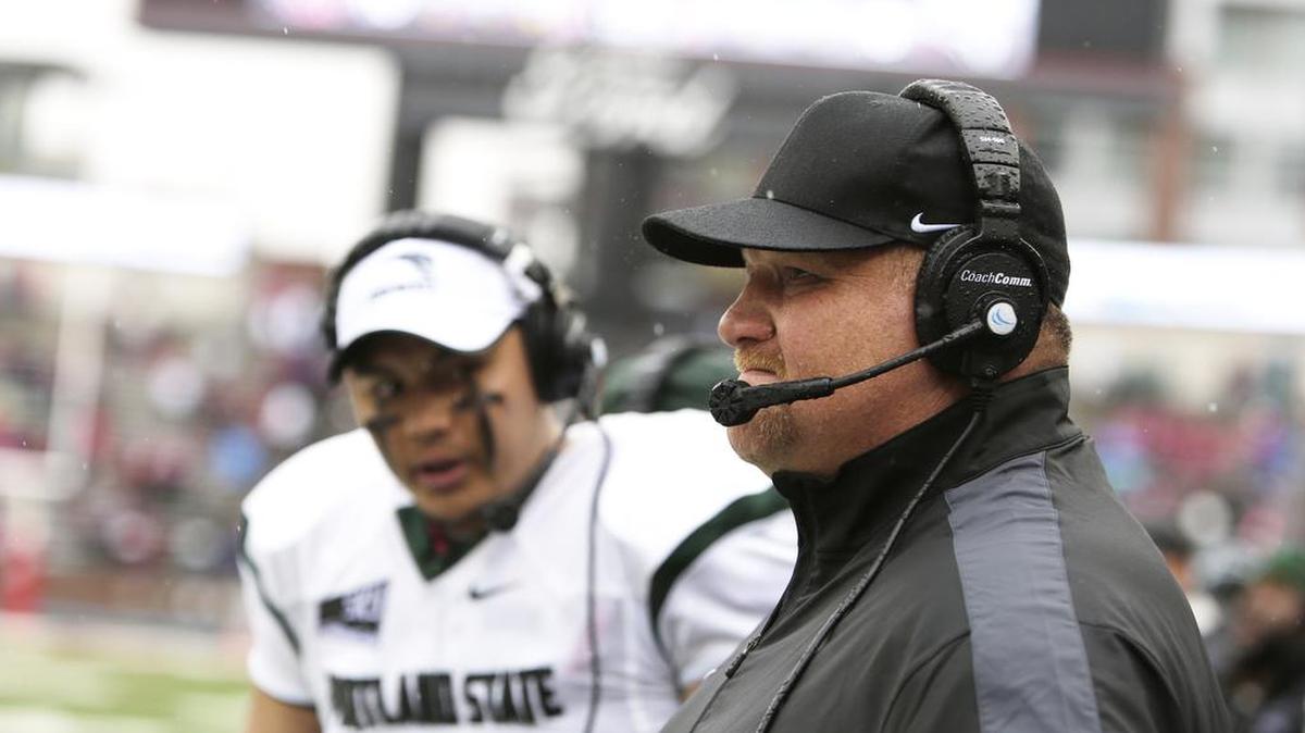 FILE - In this Sept. 5, 2015, file photo, Portland State head coach Bruce Barnum, right, watches during the first half of an NCAA college football game against Washington State, in Pullman, Wash. Coach Bruce Barnum has led the 9-2 Vikings on a dramatic turnaround _ including a season-opening victory over the Pac-12’s Washington State _ after the team went 3-9 last season.(AP Photo/Young Kwak, File)