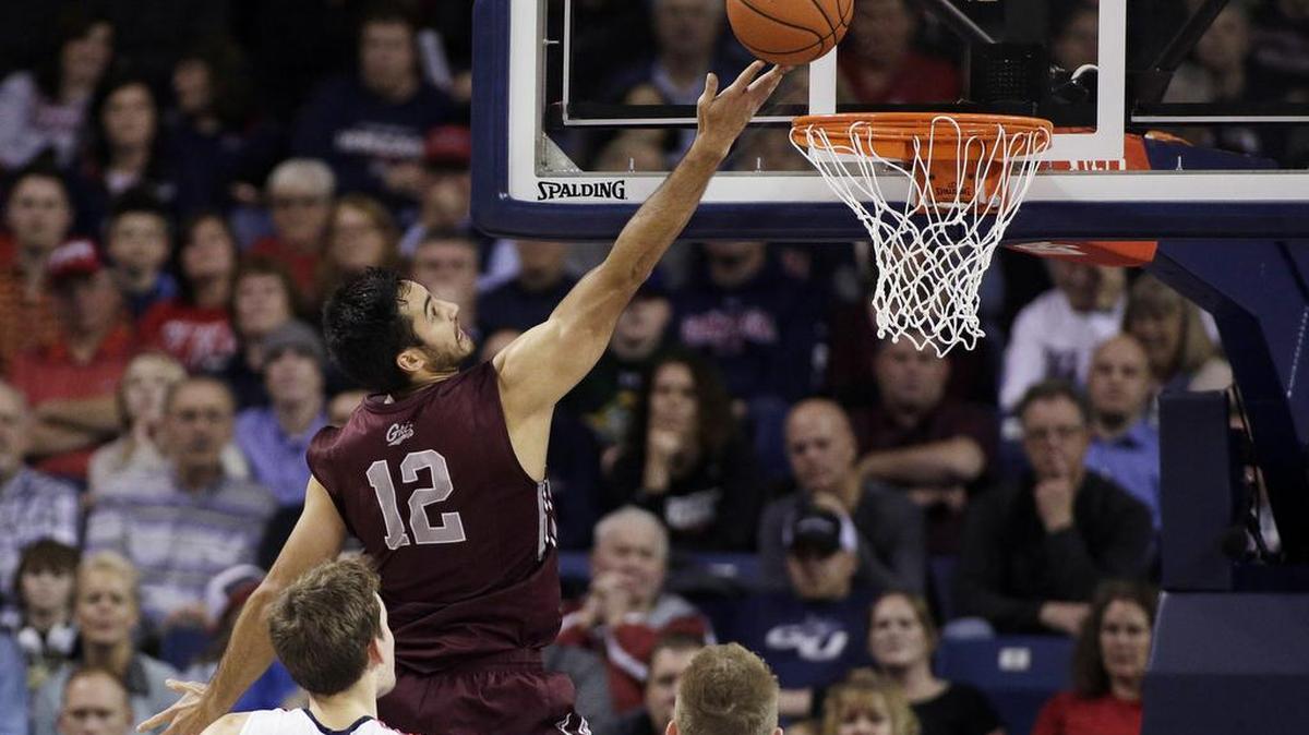 Montana's Martin Breunig (12) shoots in front of Gonzaga's Kyle Wiltjer, left, and Domantas Sabonis. Breunig is second in the Big Sky Conference with a scoring average of 20.6 points per game.