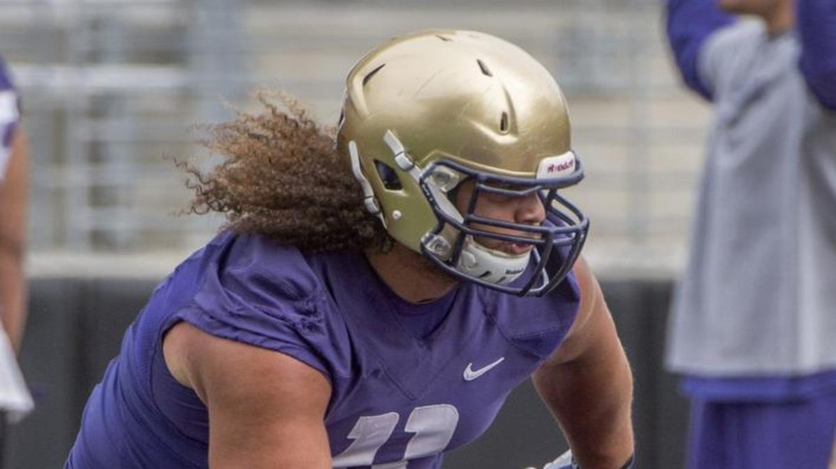 
Huskies’ third-year sophomore Elijah Qualls has stepped into the starting nose tackle position vacated by Danny Shelton. 
