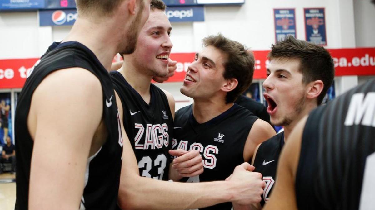 Connor Griffin, center, was part of two NCAA Tournament teams as a walk-on at Gonzaga. Griffin, a fourth-year junior, is going through his first spring with the Washington football team in preparation for his second season.