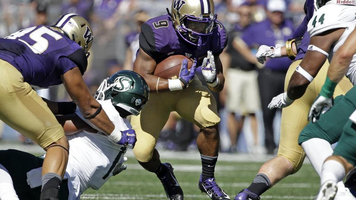 
Washington running back Myles Gaskin (9) ran for 146 yards Saturday against Sacramento State, the third-most by a true freshman in Huskies history.
