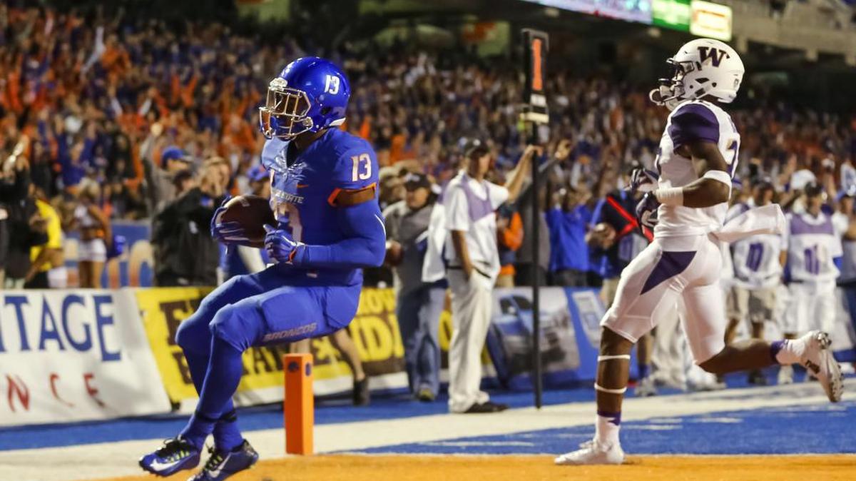 
Boise State running back Jeremy McNichols scores a first-half touchdown Friday. The Broncos ran roughshod in the first half, before the Washington defense settled down in the second half.
