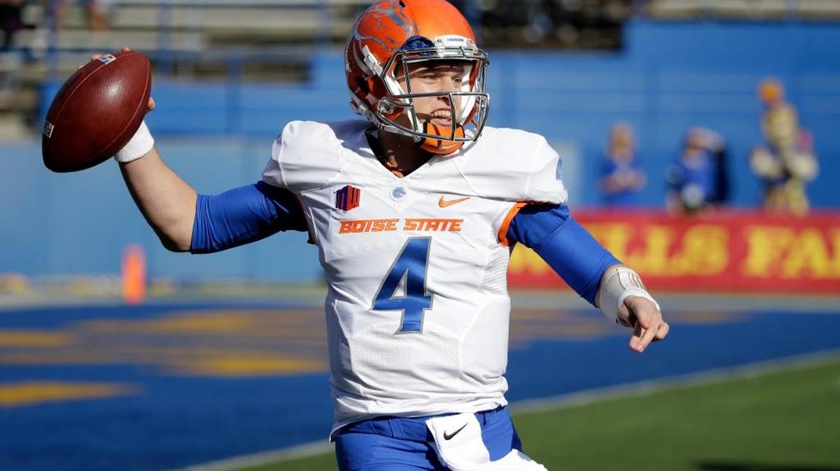 FILE -- In this Nov. 27, 2015, file photo, Boise State quarterback Brett Rypien throws against San Jose State during an NCAA college football game in San Jose, Calif. Brett Rypien opted not to follow the path of his Super Bowl MVP uncle Mark when it came time to choose a college, picking Boise State instead of Washington State. The history of the Rypien family collides this weekend when the Broncos face the Cougars.