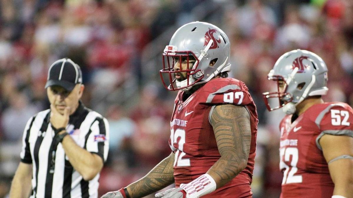 Washington State nose tackle Robert Barber (92) stands on the field during a game against Eastern Washington in Pullman, Wash., Saturday, Sept. 3, 2016. Barber has been expelled from school for his role in a fight that occurred at an off-campus party on July 23.
