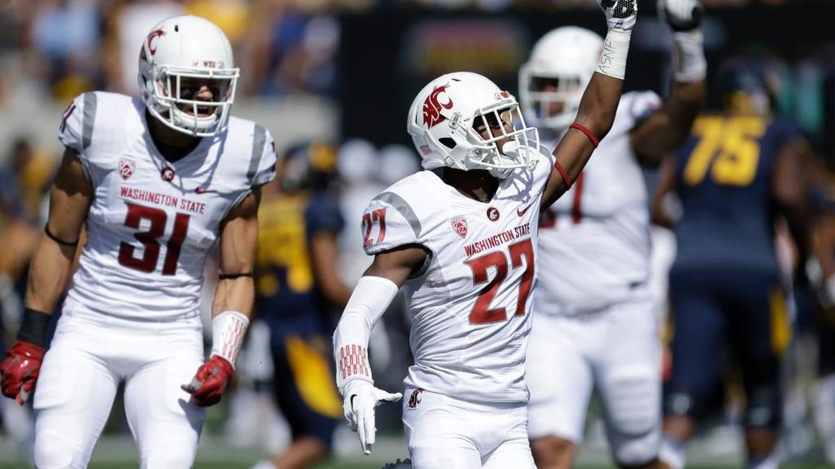 Washington State cornerback Marcellus Pippins (27) celebrates after making an interception against California during the first half of an NCAA college football game Saturday, Oct. 3, 2015, in Berkeley, Calif.