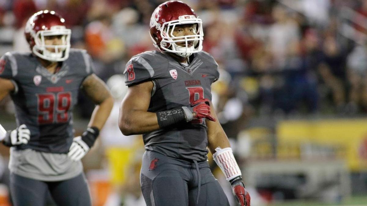 
Washington State linebacker Jeremiah Allison (8) looks to the sideline during the second half of an NCAA college football game against Wyoming, Saturday, Sept. 19, 2015, in Pullman, Wash.
