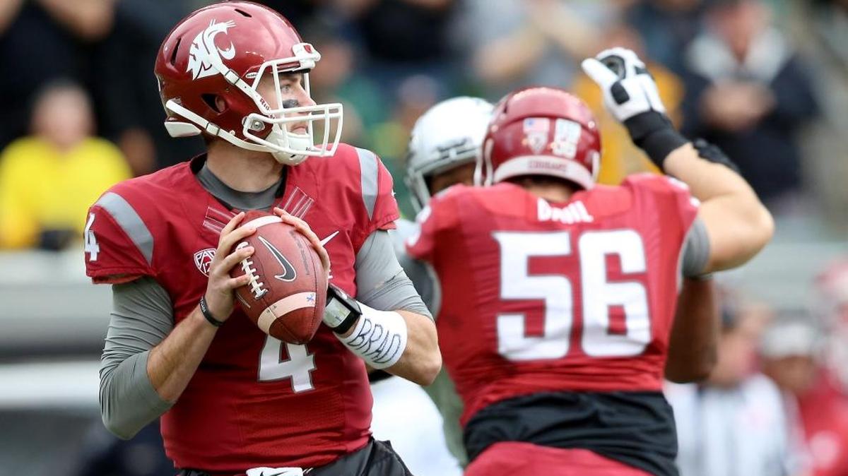 In this Oct. 10, 2015, file photo, Washington State quarterback Luke Falk (4) looks to throw during the first half of an NCAA college football game against Oregon in Eugene, Ore. Luke Falk is the latest Air Raid quarterback to benefit from Wazzu’s passing obsession.