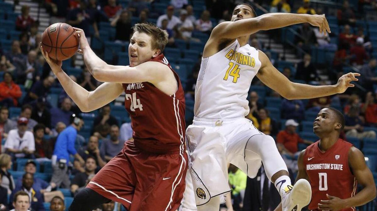 Washington State’s Josh Hawkinson, left, and California’s Christian Behrens battle for a rebound during the Pac-12 tournament in March. Hawkinson has increased his scoring from 14.7 to 18.0 points per game this season.