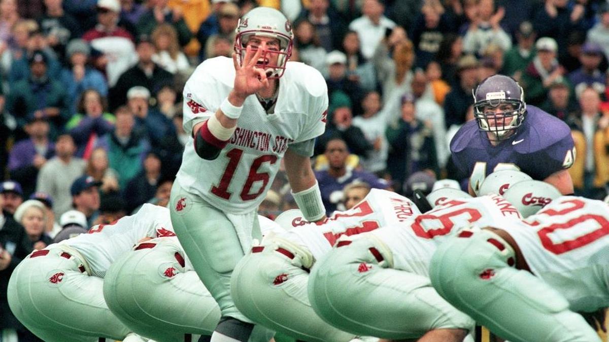 Washington State quarterback Ryan Leaf calls out an audibles against the University of Washington in the 1997 Apple Cup at Husky Stadium in Seattle, Washington. WSU won, 41-35, and went to the Rose Bowl for the first time in 67 years.