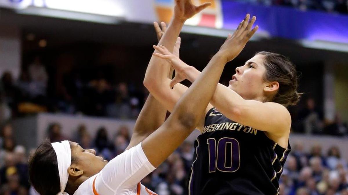 Washington’s Kelsey Plum shoots against Syracuse’s Taylor Ford during the first half of a national semifinal game at the women’s Final Four in the NCAA college basketball tournament Sunday, April 3, 2016, in Indianapolis.