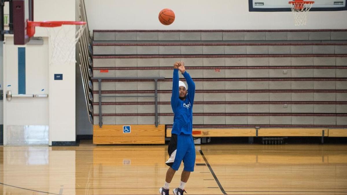 
Jaskeert Singh shoots baskets while waiting for a friend in the new Whatcom Community College Pavilion and Student Recreation Center.
