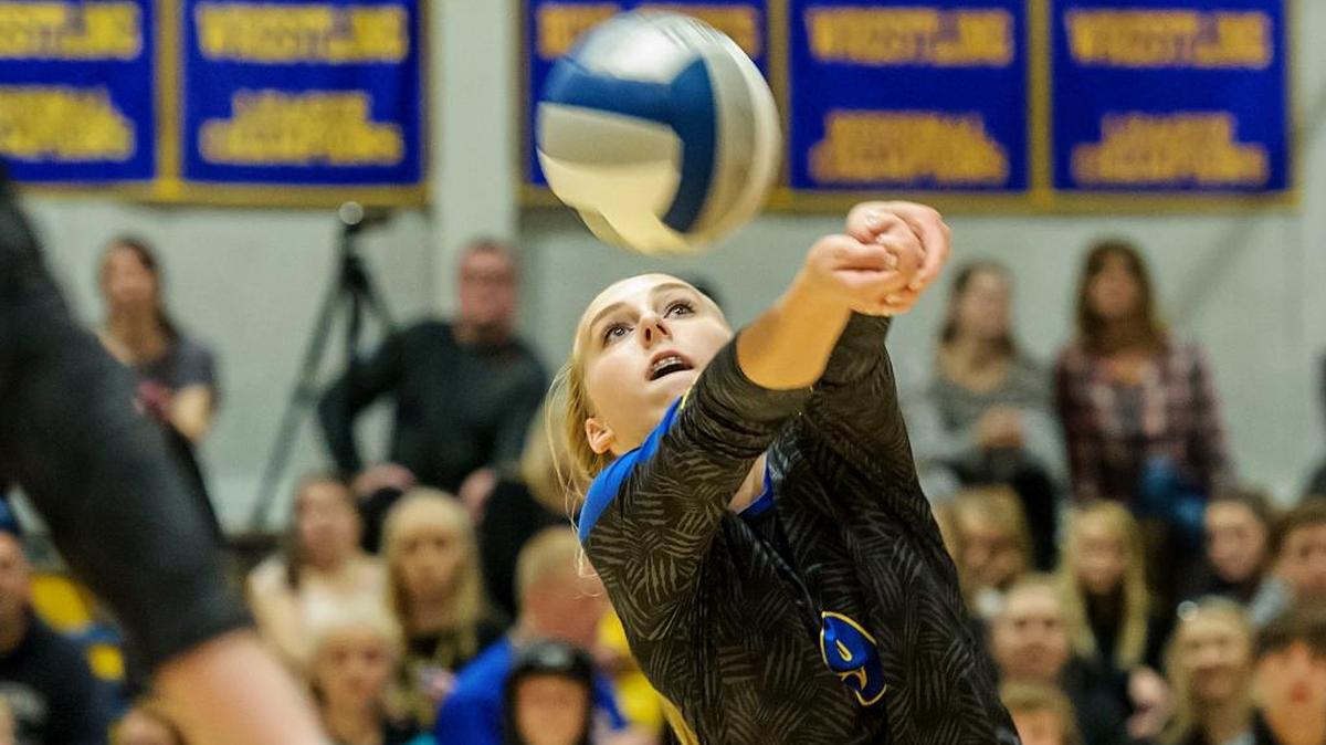 Fernale's Hailey Pelton returns a volley from Burlington-Edison duirng the first set Wednesday, Oct. 18, at Ferndale High School.