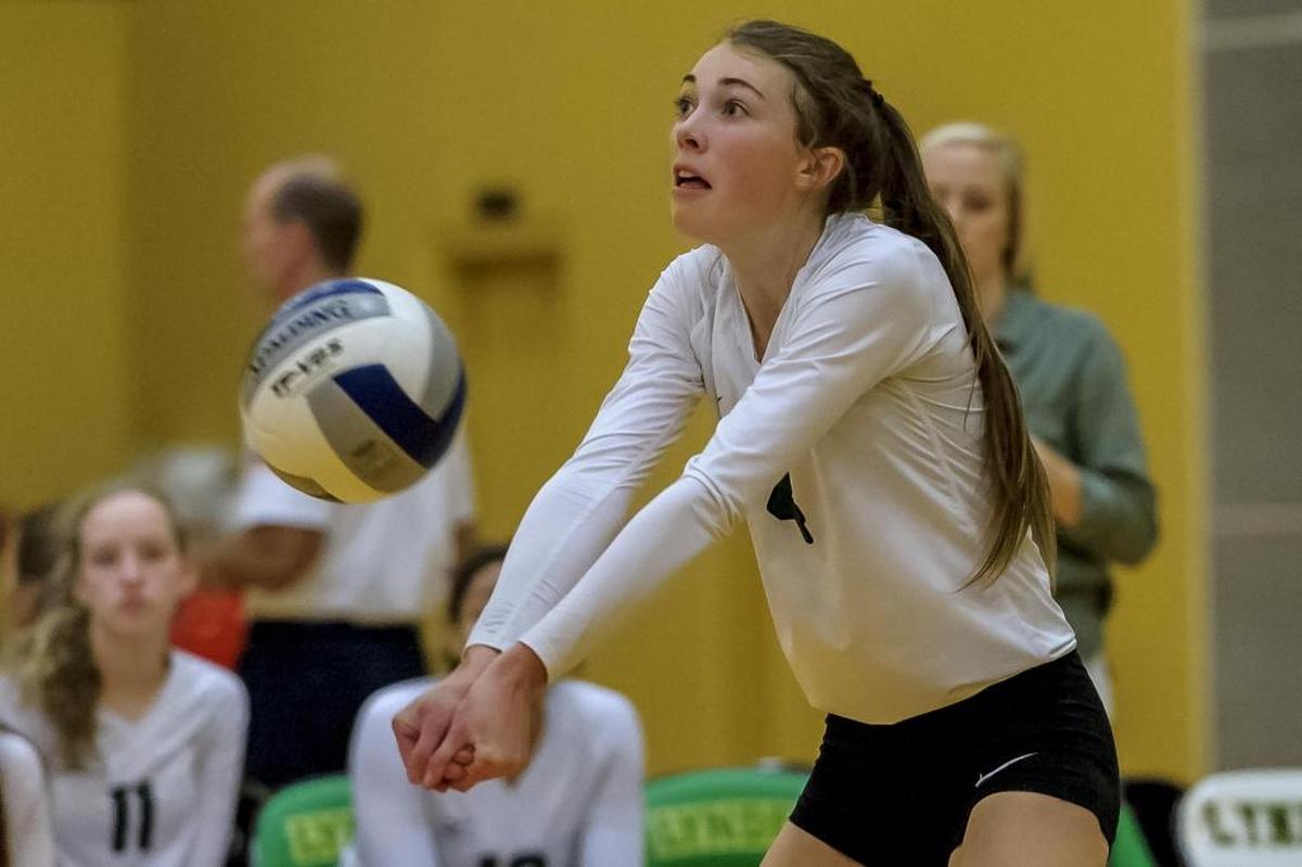Sehome’s Cameron Hodges returns a serve from Burlington-Edison during the 2A bi-district tournament championship game Nov. 4 at Lynden. The Mariners will face Spokane East Valley in the first round of the Class 2A State Tournament Friday in Lacey.