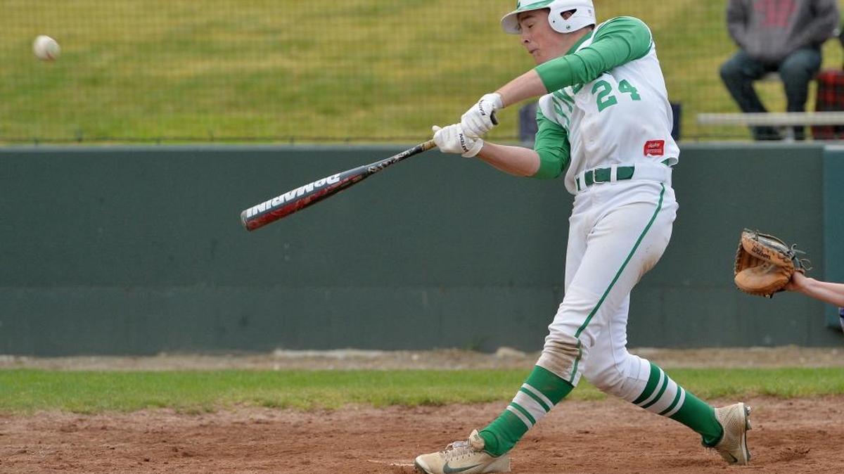 Lynden's Jordan Wittenberg hits a solo home run as Lynden and Ferndale played to a 4-4 tie after 11 innings of baseball on Friday, May 2, 2014, in Lynden.