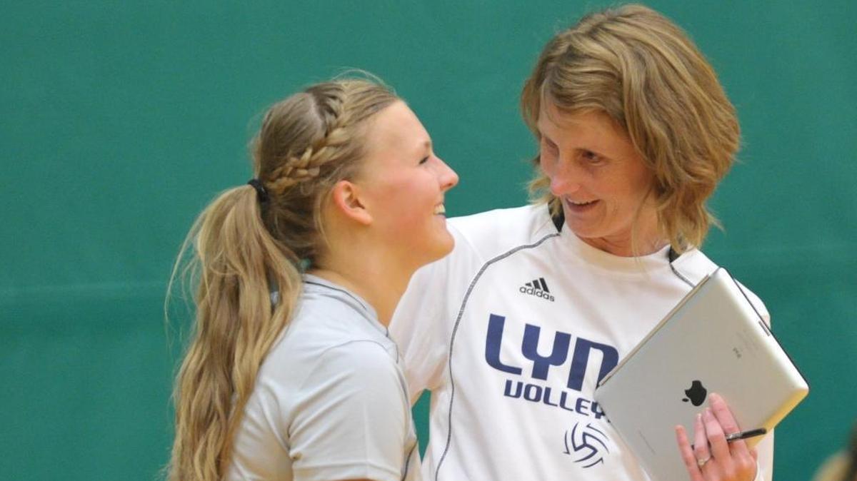 Lynden Christian coach Kim Grycel, right, talks with Emily Veening during a break in a 2012 match against Lynden. Grycel has been selected for induction into the Washington State Volleyball Hall of Fame in 2017.